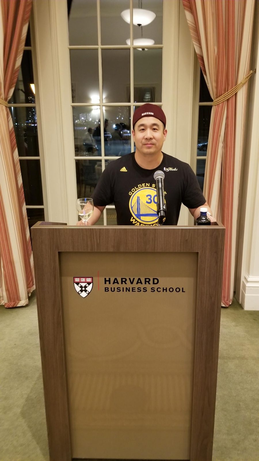 Tejune Kang speaking at a Harvard Business School OPM event